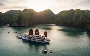 Halong Bay - Limestone moutains rising from emerald waters