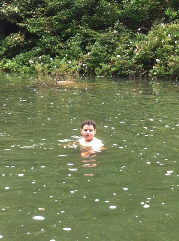 Alex playing in the river