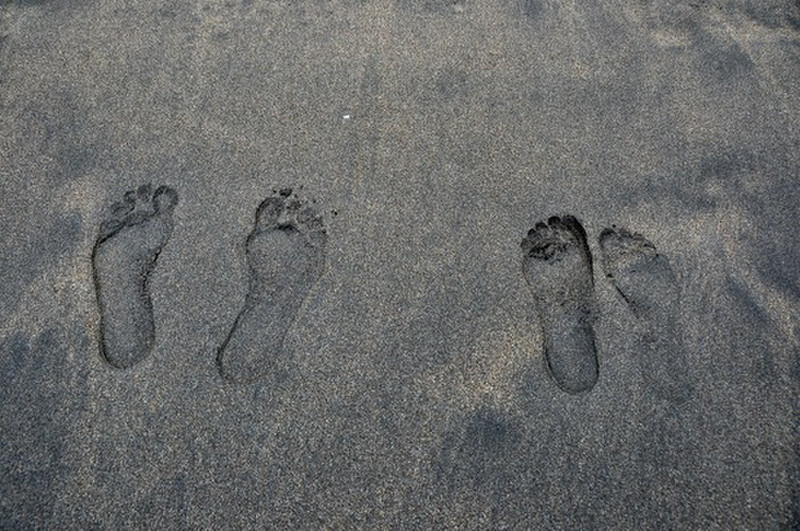Footprints In Black Sands At Hana