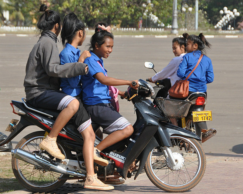 How Many Giggling Schoolgirls On One Bike