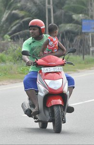 Safety First- Driver Has Helmet