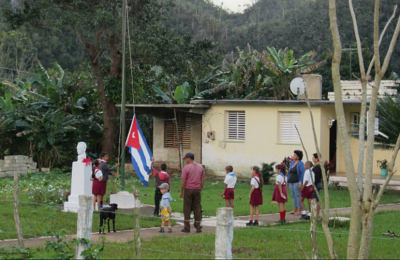 School Kids Raising The Flag