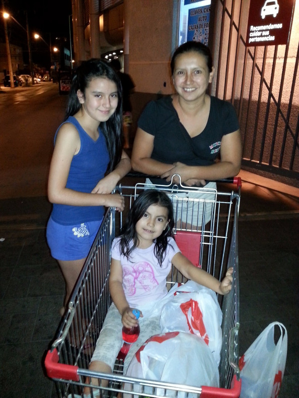 The tiny one in the shoppingcart...