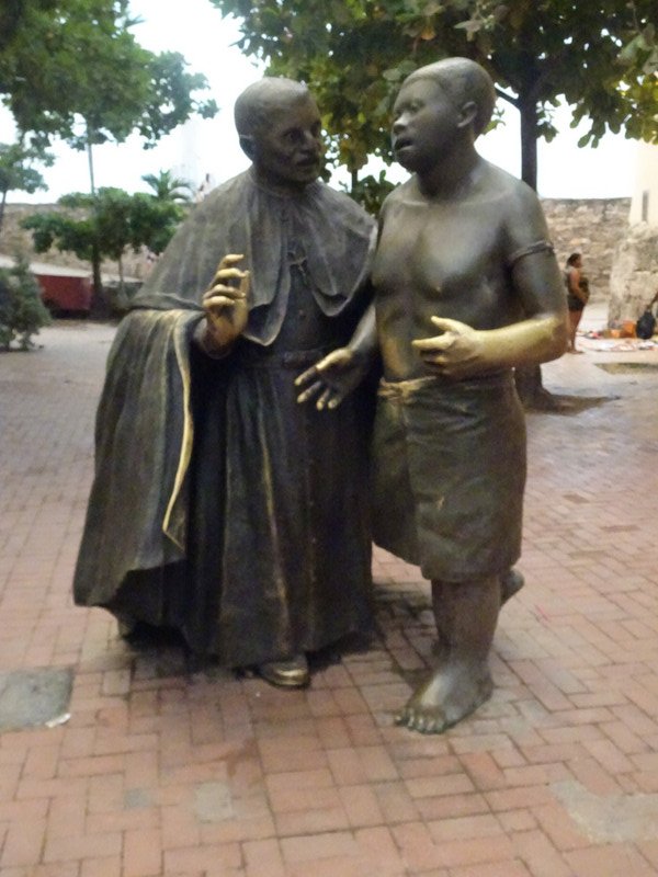 Statue of San Pedro Claver and a slave