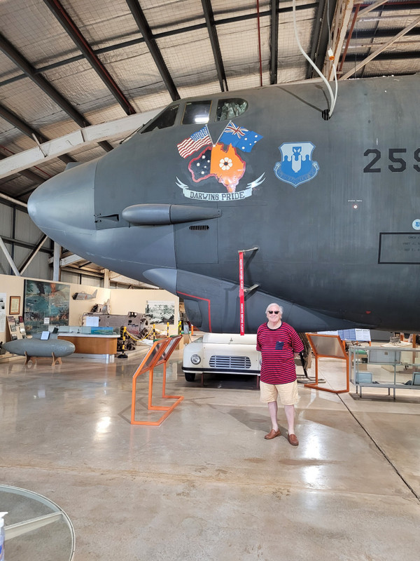 Fletcher is dwarfed by the nose of the B-52