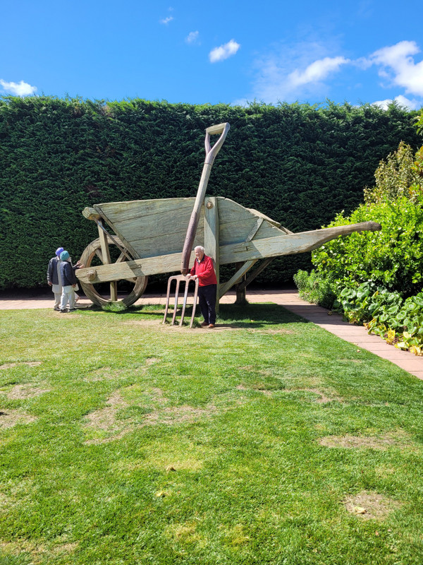 Huge wheelbarrow in the Surealist garden