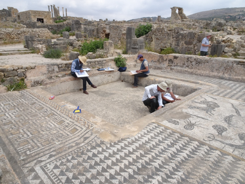 Archaeologists recoding the mosaics