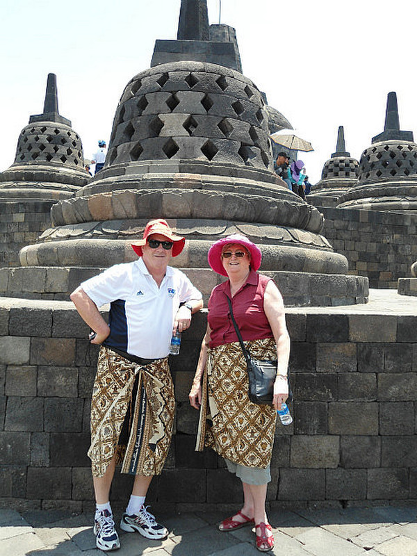 One of the stupas and us in our sarongs