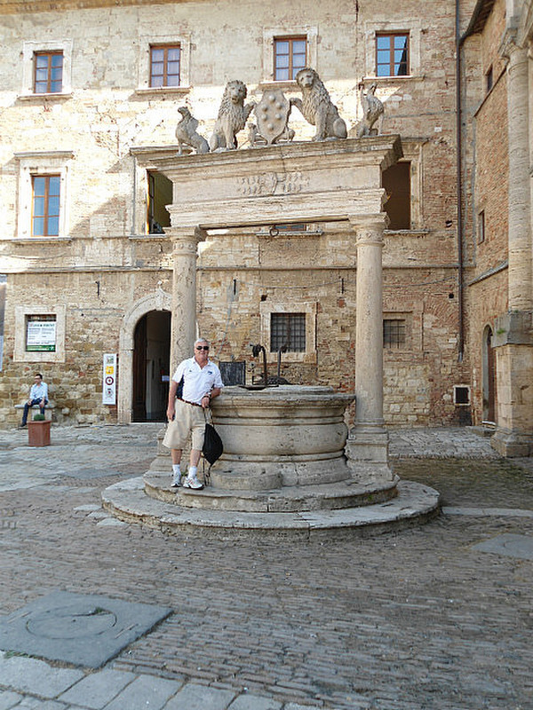 Fletcher at the well in Montepulciano