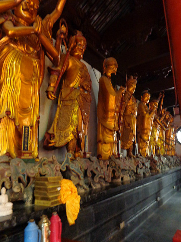 Row of staues in temple
