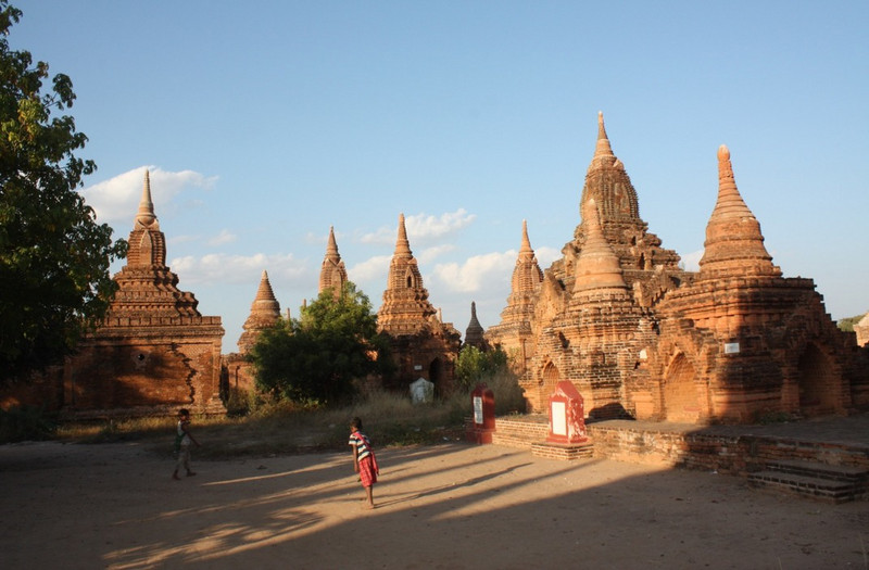 Kids playing among temples, Bagan, Myanmar
