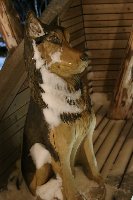 A carving of one of the Huskies