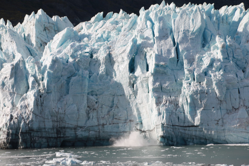 A small slither carves from Margerie Glacier