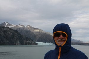 Chris braving the wind on approach to Margerie Glacier