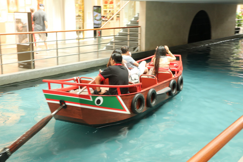 Catch a boat through the shopping mall underneath the hotel