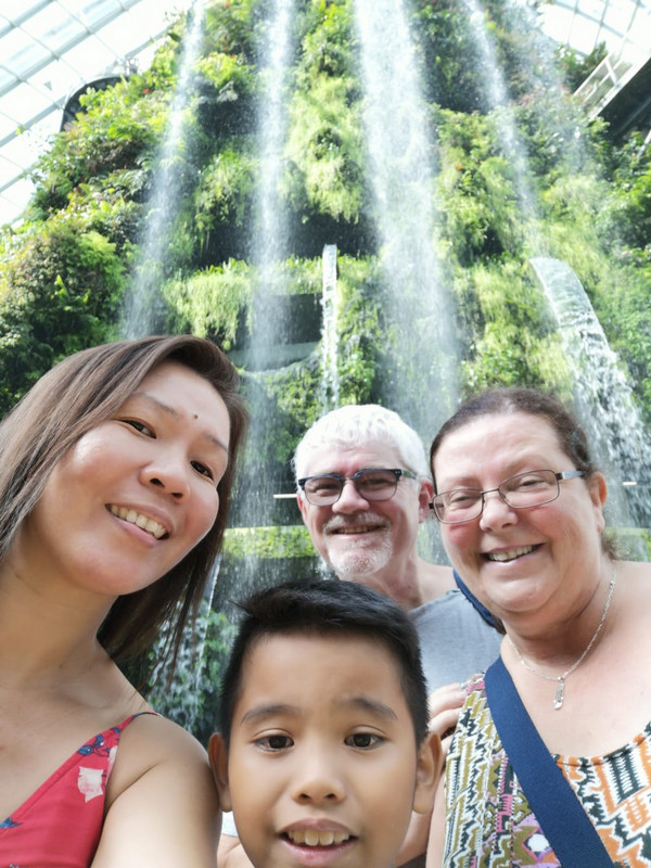 The gang in front of the water cascade at Cloud Forest