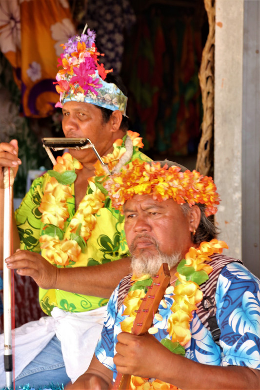 Polynesian musicians - although I'm not sure where the harmonica fits in!!
