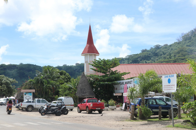 The black pearl market next to one of Vaitape's churches