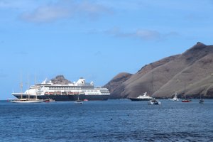 The Maasdam anchored off the barren outcrop of Nuku Hiva