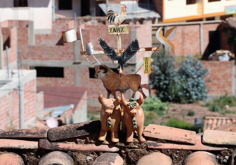 One of the unusual weather vanes on the rooftop in Chinchero