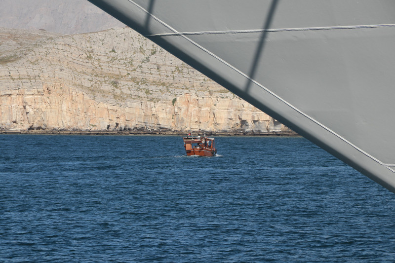 A Khasab dhow heading off in to the fjord like they have on the moon!!