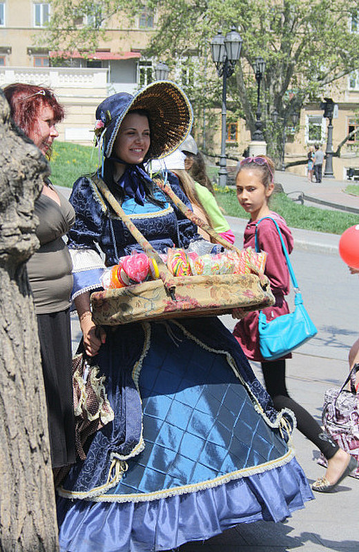 A period costumed girl selling sweeties, Odessa