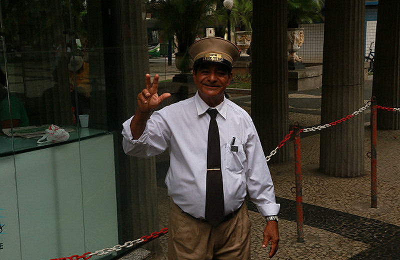 A cheerful tram conductor, happy in his work!!