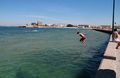 Jumping overboard - Kids at play in Cadiz