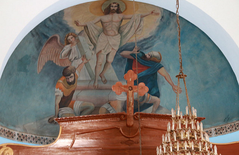 The Ornate mural above the alter