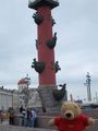 Pooh in front of a Rostral column
