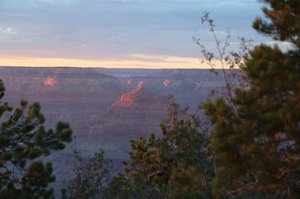 The sun is slowly setting oer the Grand Canyon