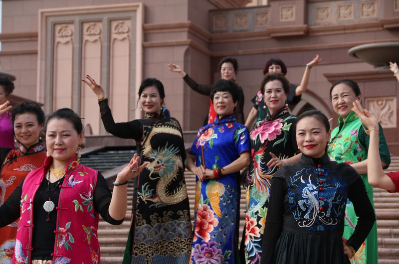 A group of Chinese ladies paying a visit