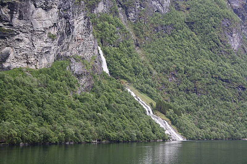 Green slopes of a Storfjord  waterfall