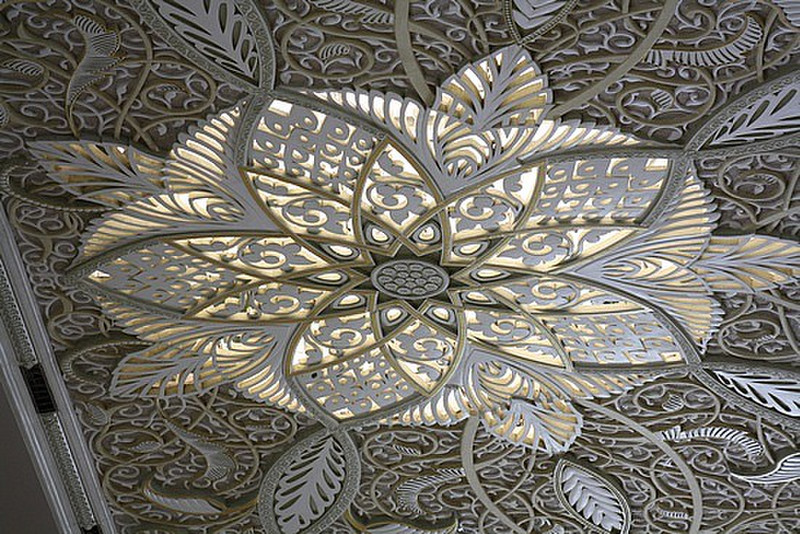 One of the ornate decorations on the ceiling