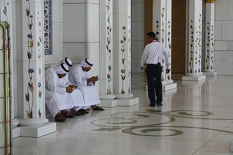 Men and their ipods!! The Grand Mosque
