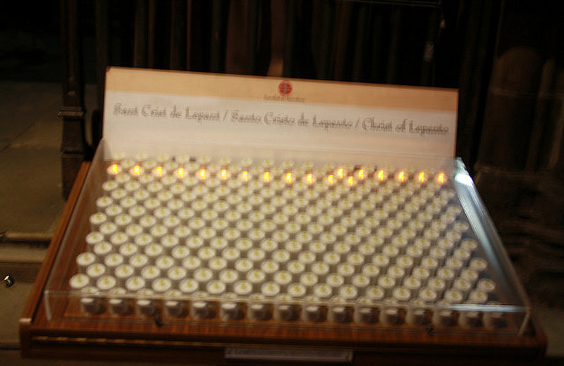 Light a candle. Barcelona cathedral