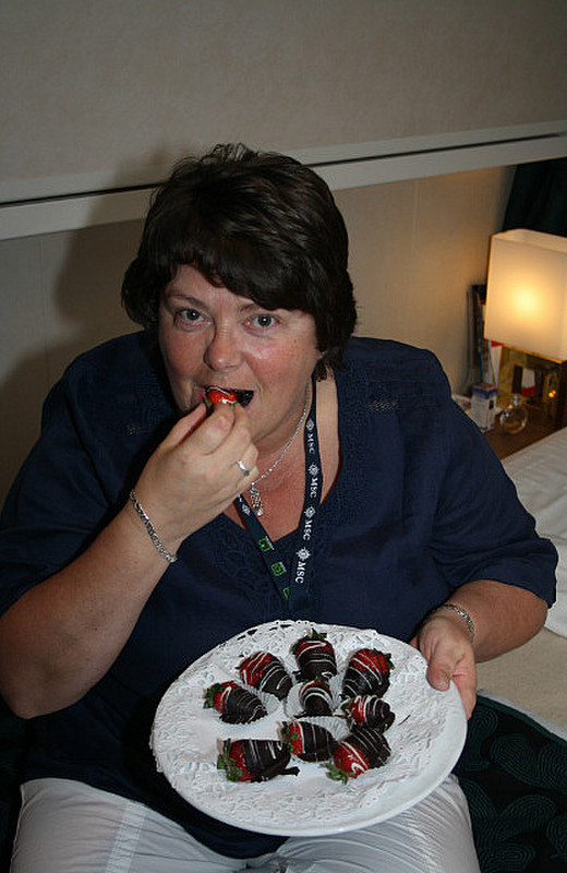 Roisin tucking in to our chocky strawberries!