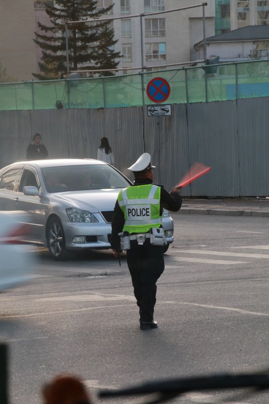 A traffic cop at 9pm in Ulaan Baatar