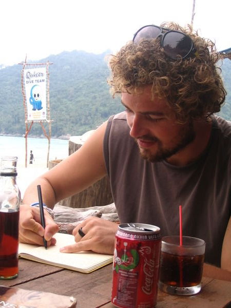 Journal writing with some Orang utan arrak (rum)