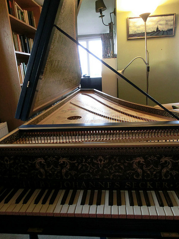 A piano that John made, in his home