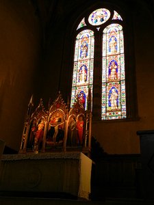 Main altar at Santa Trinita church