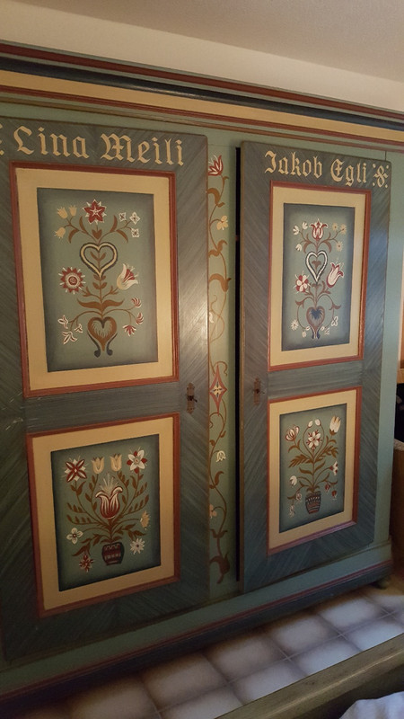 Pretty hand painted Swiss style armoire