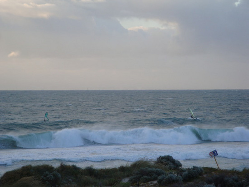 Windsurfers tacking the rough seas