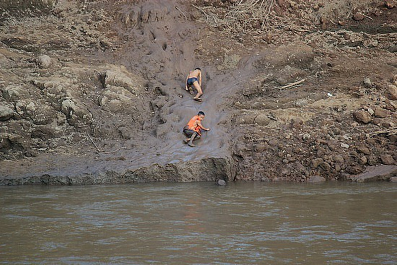 Local Kids On Natural Waterslide