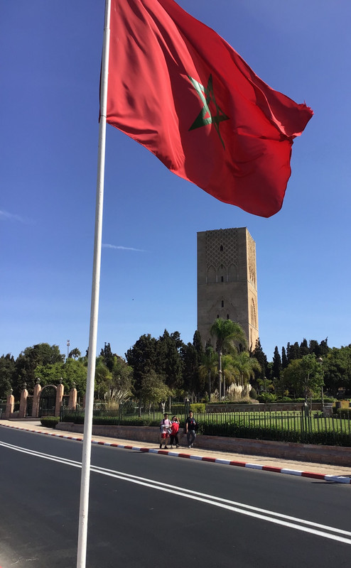 The Moroccan flag flies over the Hassan Tower.