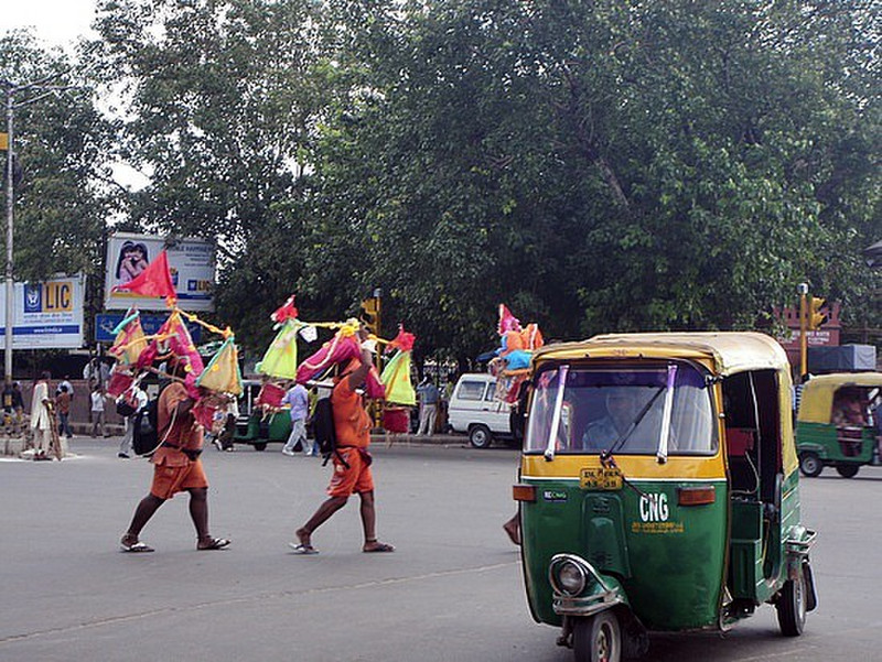 Pilgrims and tuktuk