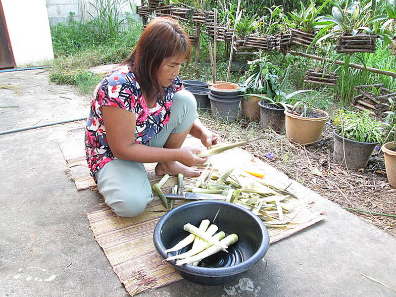 Jai strips bamboo ready to cook