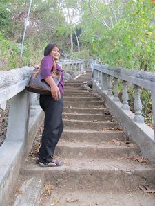 Climbing the steps to Phnom Chhnork temple