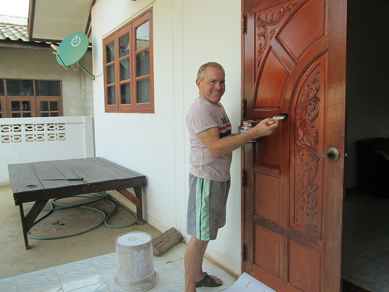 Staining the front doors ...