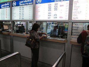 Buying bus tickets at Mo Chit